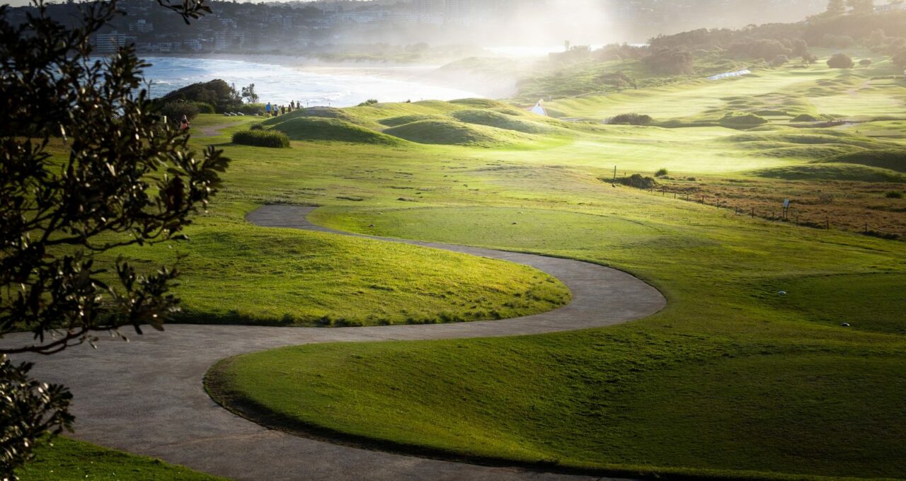 Green fairway running down to the ocean in New South Wales.