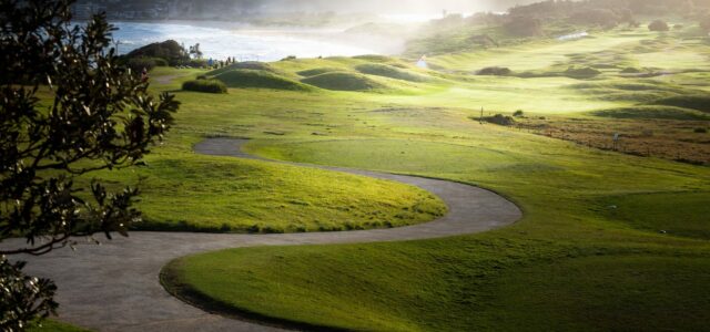 Green fairway running down to the ocean in New South Wales.