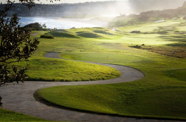 Green fairway running down to the ocean in New South Wales.