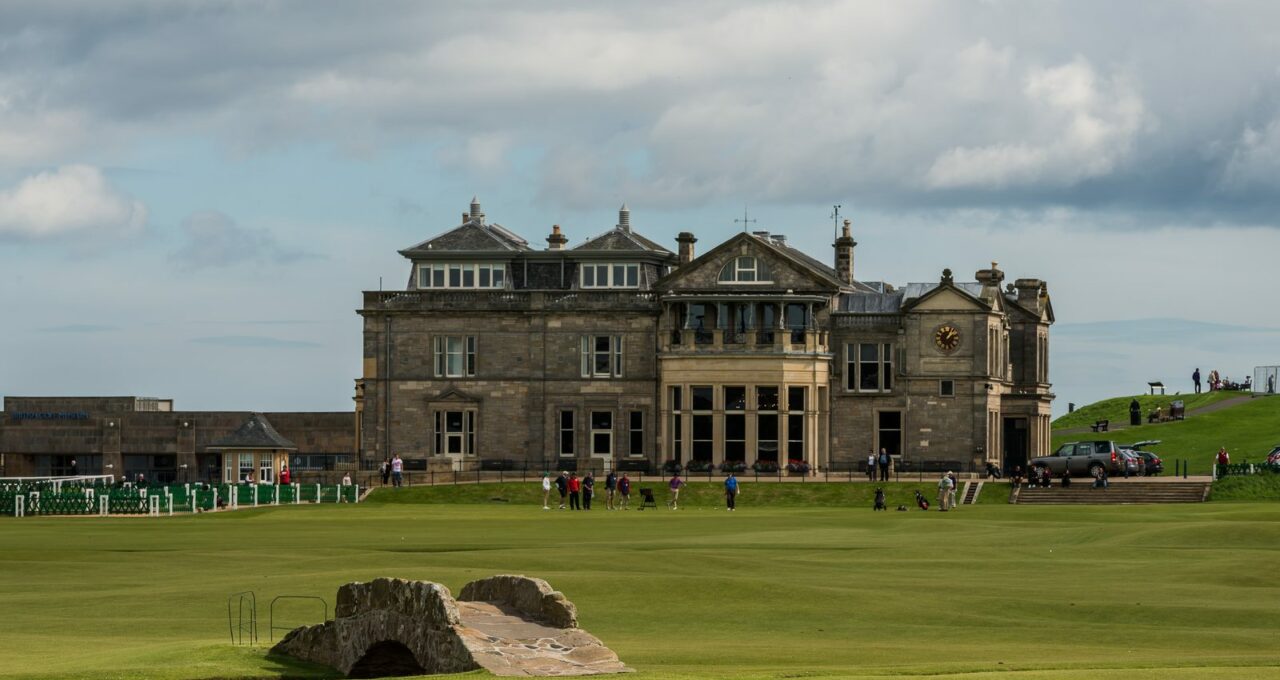 The R&A clubhouse and the Swilcan Bridge on the Old Course at St Andrews.