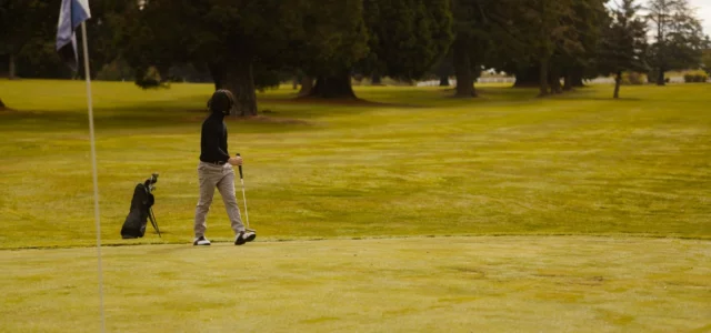 Lone golfer on a public course