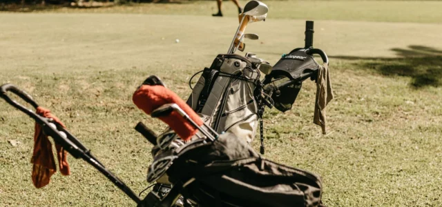 Golf bag and clubs on the ground