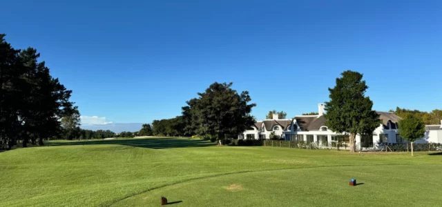 View across a course towards the clubhouse